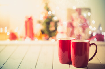 Couple red mugs on Christmas