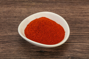 Dry paprika powder in the bowl