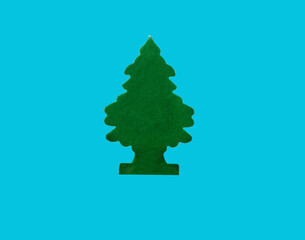 christmas tree made of green velvet cardboard on a blue background