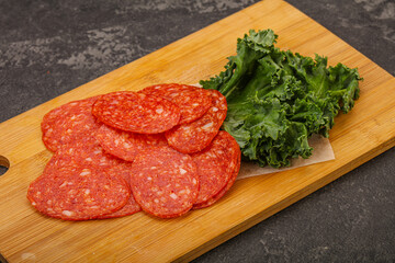 Italian spycy pepperoni sausage slices