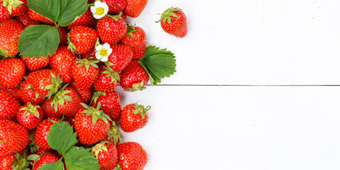 Strawberries berries fruits strawberry berry fruit with copyspace copy space on a wooden board...