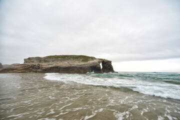 sunset at the Catedrales or Augas Santas beach, in Ribadeo. Lugo, Galicia