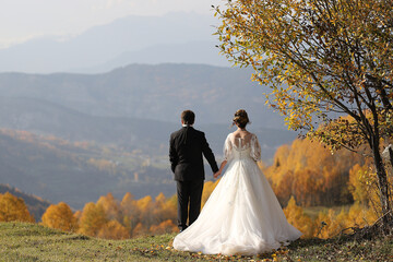 romantic couples watching autumn landscapes.