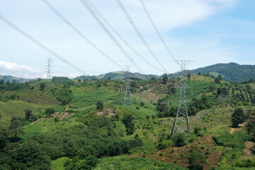 Power lines and high-voltage poles were installed on the mountains and mountain peaks.