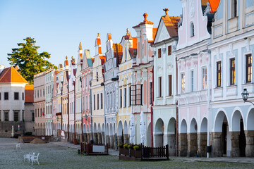 Row of traditional houses in the town of Telč, Czech Republic, after the sunrise. These houses on the main square are UNESCO heritage site.