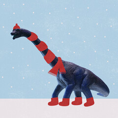 Contemporary art collage of dinosaur wearing red scarf, hat and boots walking on the snow under snowflakes