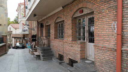 Fototapeta na wymiar old brick building. house made of bricks. vintage brick buildings