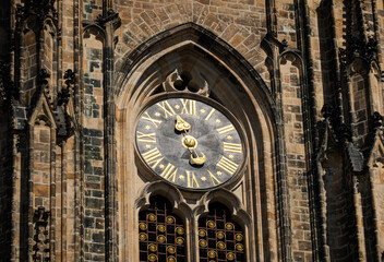 Prague Castle and Saint Vitus Cathedral, amazing architectural details and a great construction photographer during a sunny summer day. Landmarks of Europe. Travel photography.