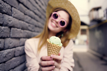 attractive woman on the street with ice cream vacation Lifestyle