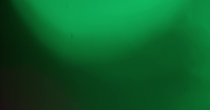 Motion of Colorful Bokeh Lights Rays on Black Background. Lamp Rays Lens Flare Effect Compositing. 4K Resolution. Using for Music Backgrounds. Wallpaper. Movable Screensaver. Pink. Green