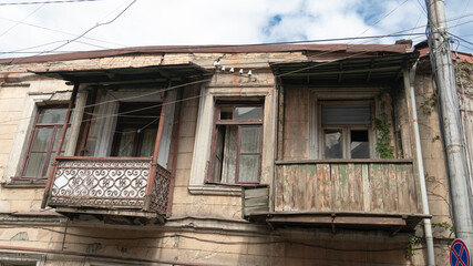 Fototapeta na wymiar old vintage balconies. old buildings. old buildings and beautiful balconies