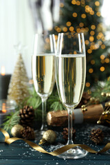 Concept of New Year celebration with champagne on wooden table