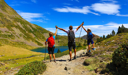 happy family traveler enjoy beautiful view of mountain lake