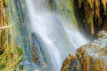 Fototapeta na wymiar Movement of water flowing in waterfall.