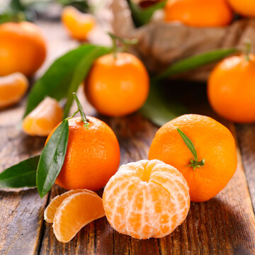 clementine,  mandarin orange fruit and leaves
