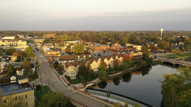Small quiet american town on a sunny morning. Midwest USA. Aerial view , Overhead establishing shot. Sunset sunrise sunlight