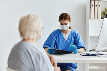 Obraz premium nurse and patient patient examination checkup