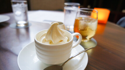 Soft ice cream in a white cup