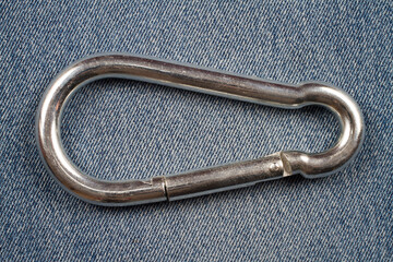 Firefighter carbine on denim background.