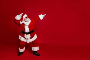 Profile photo of crazy entertainer old man dance empty space wear santa hat costume isolated red color background