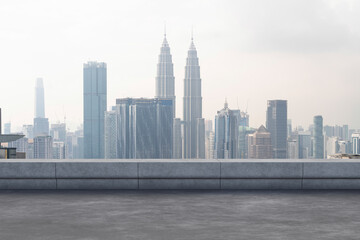 Fototapeta premium Panoramic Kuala Lumpur skyline view, concrete observatory deck on rooftop, daytime. Asian corporate and residential lifestyle. Financial city downtown, real estate. Product display mockup empty roof