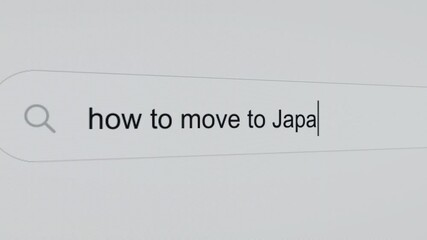 How to move to Japan - Pc screen internet browser search engine bar typing moving abroad related question.