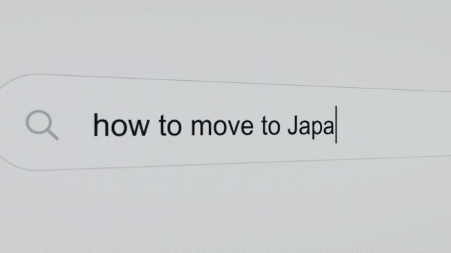 How to move to Japan - Pc screen internet browser search engine bar typing moving abroad related question.