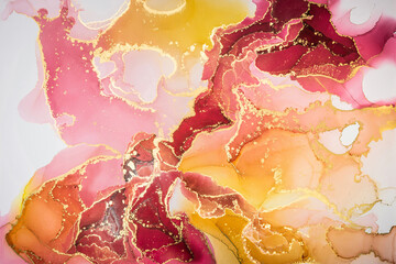 Abstract fluid art painting background in alcohol ink technique, mixture of pink, maroon and yellow paints with glowing golden veins. Transparent overlayers of ink create lines and gradients.  - 463809739