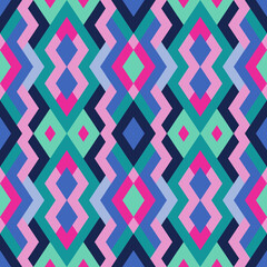 Abstract seamless pattern. Vector geometric background of triangles in green, pink and blue colors. Mosaic texture for textile, clown, carpeting, warp, book cover, clothes