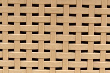 Plastic brown lattice basket close-up macro. Background, texture