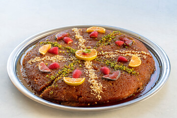 Turkish dessert bread kadayif on a white background. Local name ekmek kadayifi