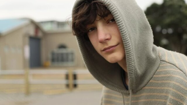 portrait of teenager boy on natural background. adolescence and youth concept. casual look 