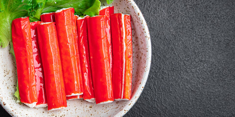 crab sticks semi-finished stick seafood fresh eat meal snack on the table copy space food background rustic  © Alesia Berlezova