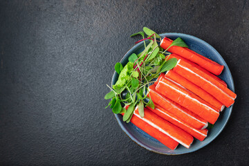 crab sticks semi-finished stick seafood fresh eat meal snack on the table copy space food background rustic  © Alesia Berlezova