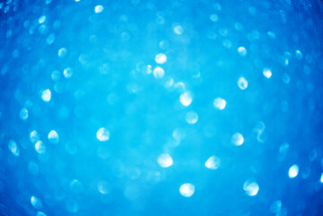 Defocus light blue christmas color. Glitter background, new year.
