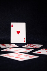 Ace of hearts card guarding the rest of the cards of hearts