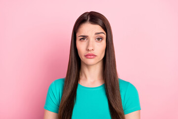 Fototapeta premium Photo of puzzled suspicious young woman raise eyebrow unhappy think unsure isolated over pink color background