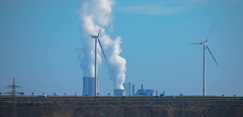 Panoramic view of coal-fired power station with smoking cooling towers. Neurath North Rhine...