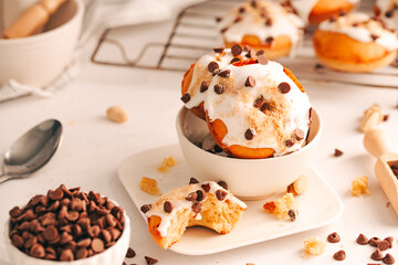 Baked donuts with cream and chocolate