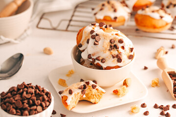 Baked donuts with cream and chocolate