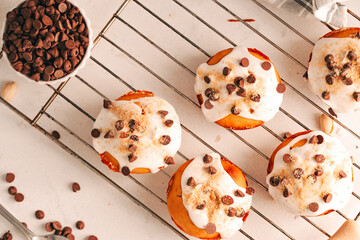 Baked donuts with cream and chocolate