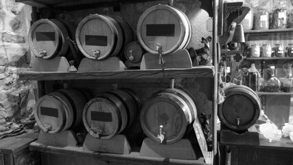 vintage barrels with guilt in the basement