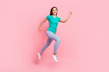 Fototapeta na wymiar Full length profile side photo of young woman happy positive smile jump up go walk run isolated over pastel color background