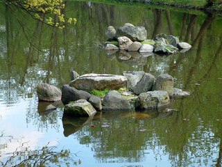 Asian park in Europe. 
Beautiful, incredibly refined and arranged in the Asian style garden. Full of greenery, stones and water. With a gentle hum, it calms our nerves.