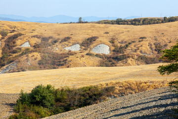 Asciano (SI), Italy - August 02, 2021: Typical scenary of Crete Senesi, Asciano, Siena, Tuscany, Italy