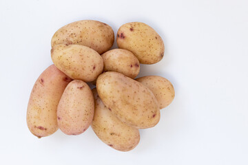 pile of potatoes isolated on white background