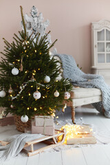 Decorated Christmas tree in living room interior