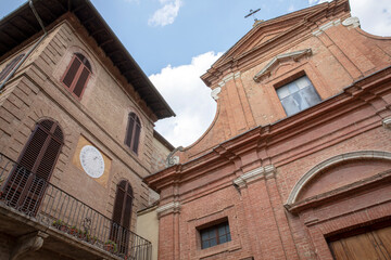 Fototapeta na wymiar Buonconvento (SI), Italy - August 01, 2021: Saint Pietro e Paolo church, Buonconvento, Tuscany, Italy