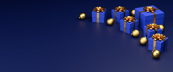Blue gift boxes with golden ribbon and bow and christmas baubles on a blue stone background. Copy...