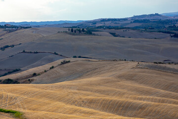 Val d' Orcia (SI), Italy - August 05, 2021: Typical landscape in val d' Orcia, Tuscany, Italy